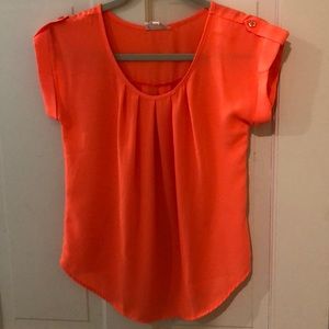Bright neon orange girls blouse